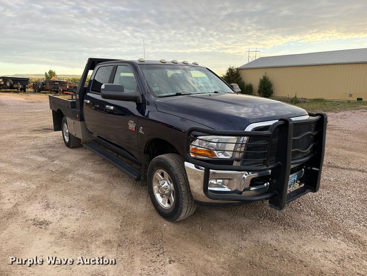 image for item EA0568 2012 Dodge Ram 3500 Crew Cab flatbed pickup truck