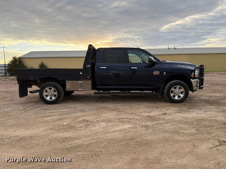 image for item EA0568 2012 Dodge Ram 3500 Crew Cab flatbed pickup truck