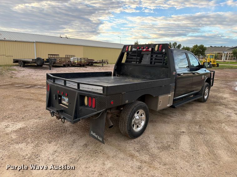 image for item EA0568 2012 Dodge Ram 3500 Crew Cab flatbed pickup truck