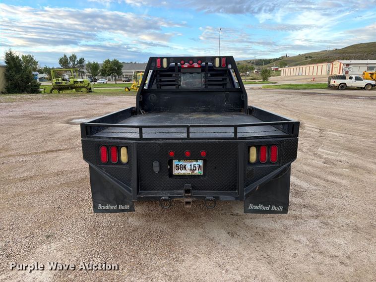 image for item EA0568 2012 Dodge Ram 3500 Crew Cab flatbed pickup truck