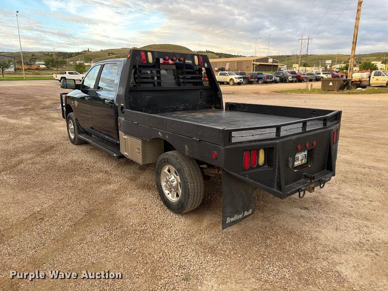image for item EA0568 2012 Dodge Ram 3500 Crew Cab flatbed pickup truck