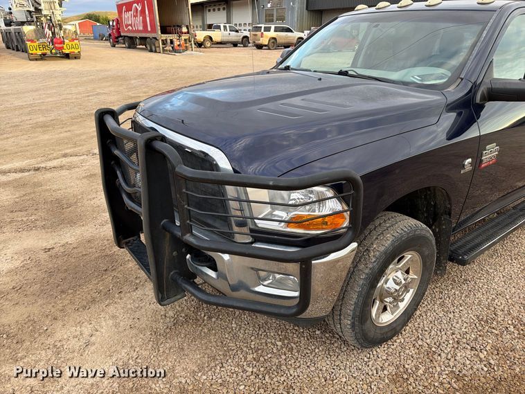 image for item EA0568 2012 Dodge Ram 3500 Crew Cab flatbed pickup truck
