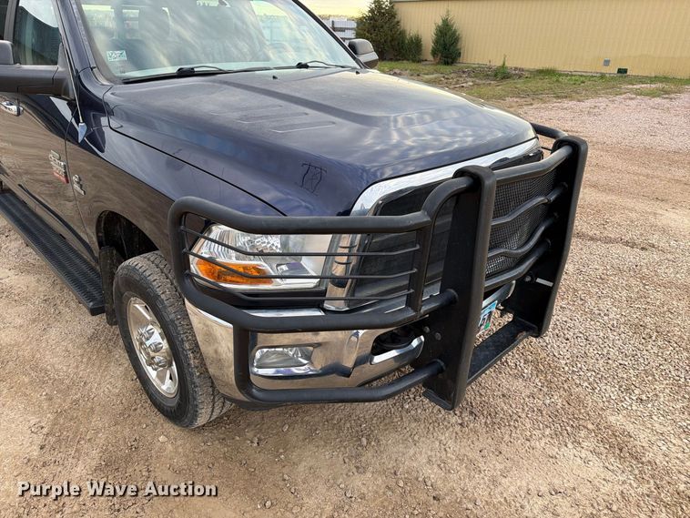image for item EA0568 2012 Dodge Ram 3500 Crew Cab flatbed pickup truck