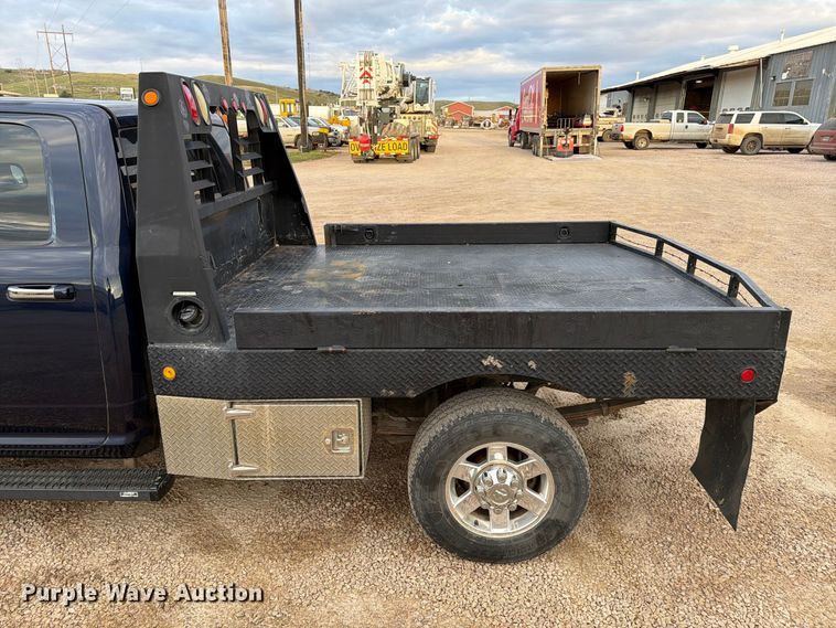 image for item EA0568 2012 Dodge Ram 3500 Crew Cab flatbed pickup truck