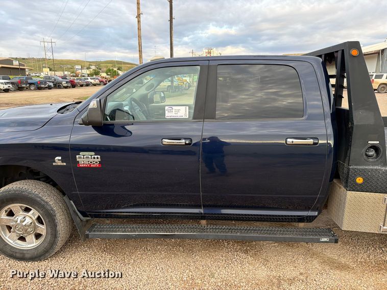 image for item EA0568 2012 Dodge Ram 3500 Crew Cab flatbed pickup truck