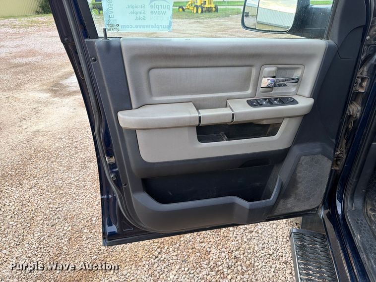 image for item EA0568 2012 Dodge Ram 3500 Crew Cab flatbed pickup truck