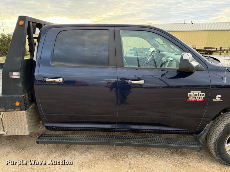 image for item EA0568 2012 Dodge Ram 3500 Crew Cab flatbed pickup truck