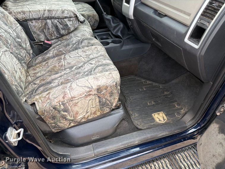 image for item EA0568 2012 Dodge Ram 3500 Crew Cab flatbed pickup truck