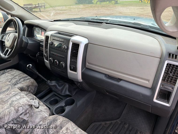 image for item EA0568 2012 Dodge Ram 3500 Crew Cab flatbed pickup truck