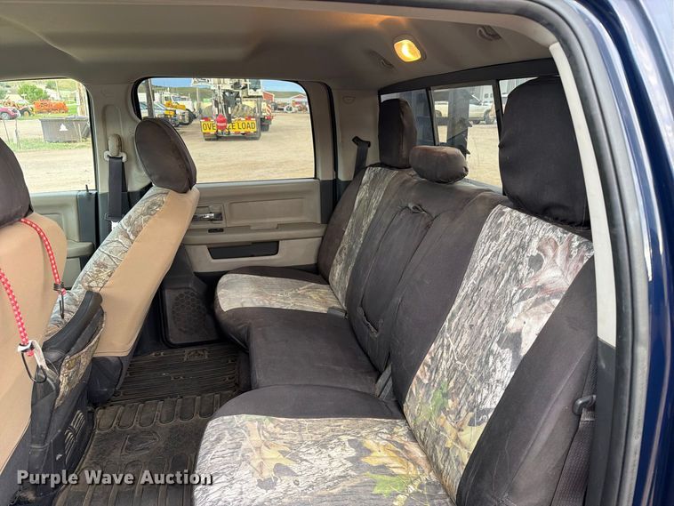 image for item EA0568 2012 Dodge Ram 3500 Crew Cab flatbed pickup truck