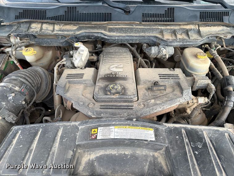 image for item EA0568 2012 Dodge Ram 3500 Crew Cab flatbed pickup truck