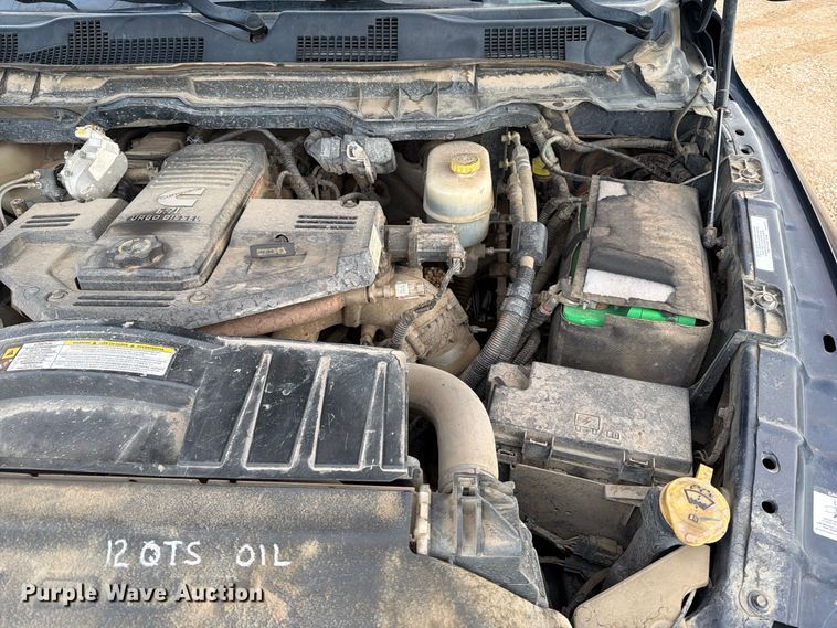 image for item EA0568 2012 Dodge Ram 3500 Crew Cab flatbed pickup truck