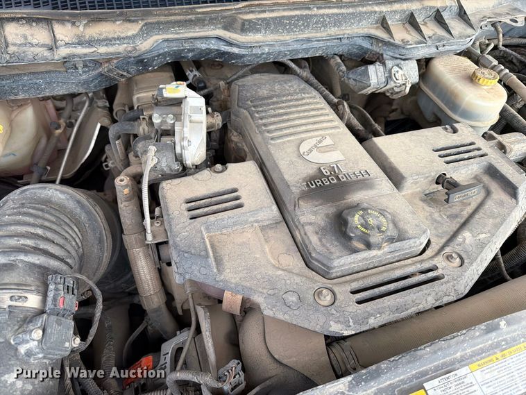 image for item EA0568 2012 Dodge Ram 3500 Crew Cab flatbed pickup truck