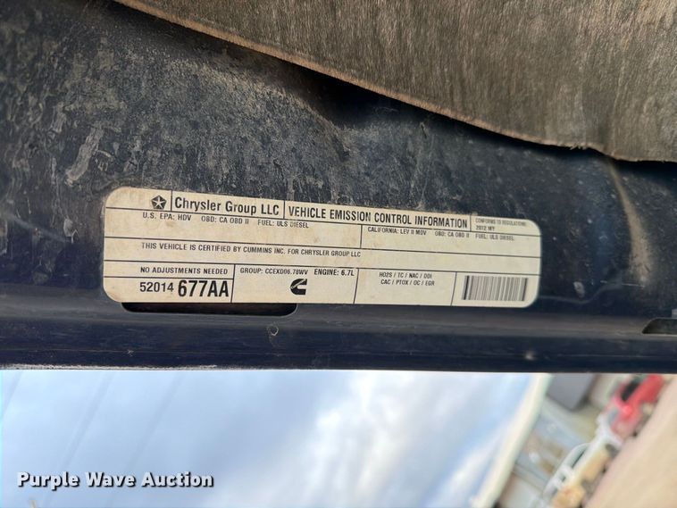 image for item EA0568 2012 Dodge Ram 3500 Crew Cab flatbed pickup truck