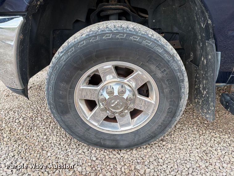 image for item EA0568 2012 Dodge Ram 3500 Crew Cab flatbed pickup truck
