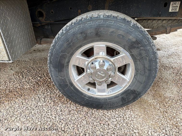 image for item EA0568 2012 Dodge Ram 3500 Crew Cab flatbed pickup truck