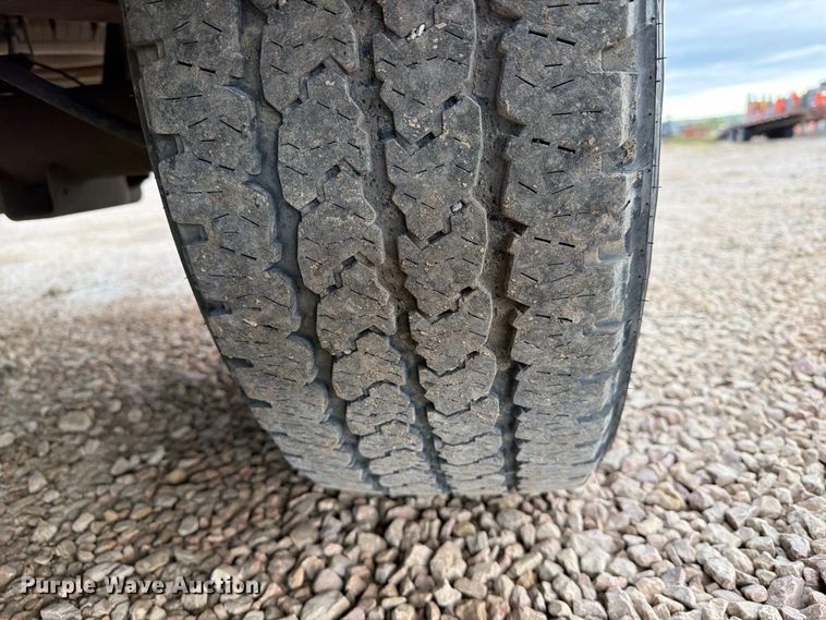 image for item EA0568 2012 Dodge Ram 3500 Crew Cab flatbed pickup truck