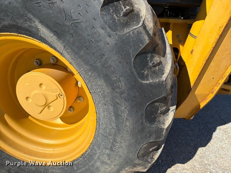 image for item EP7889 2015 John Deere 310SK backhoe