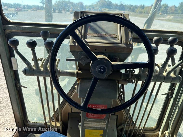 image for item ER3454 1983 Caterpillar 130G MIL motor grader