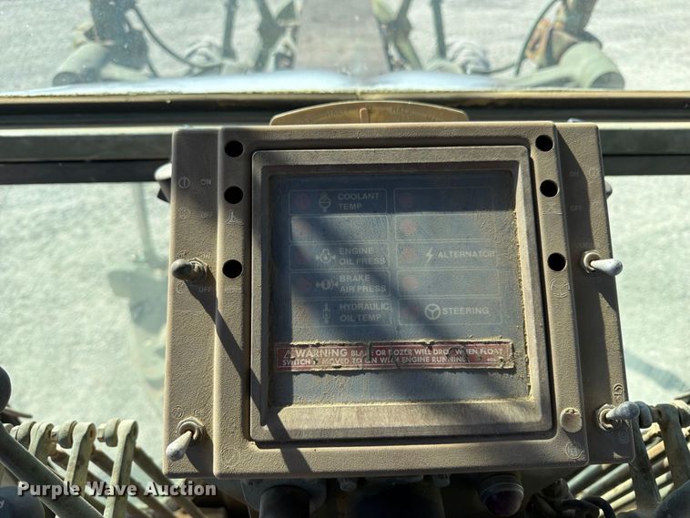 image for item ER3454 1983 Caterpillar 130G MIL motor grader