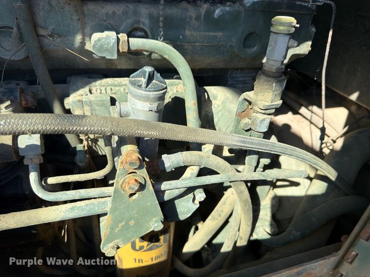 image for item ER3454 1983 Caterpillar 130G MIL motor grader