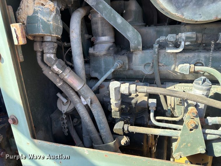image for item ER3454 1983 Caterpillar 130G MIL motor grader