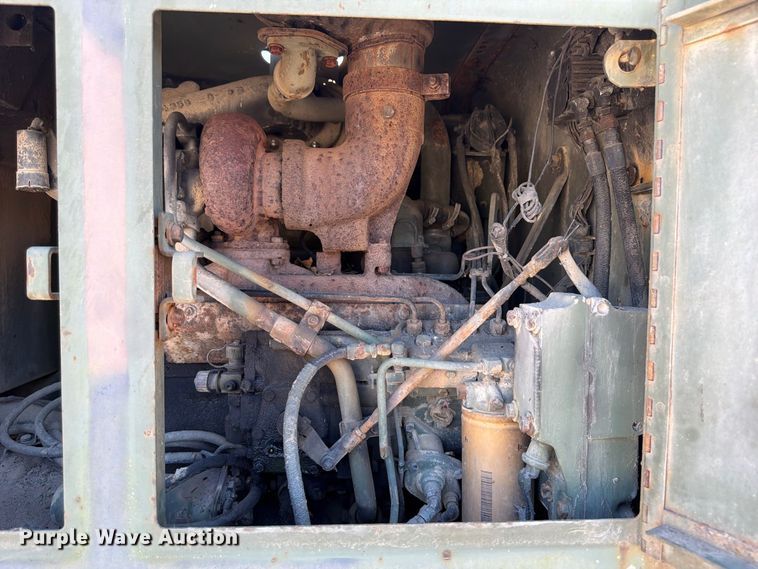 image for item ER3454 1983 Caterpillar 130G MIL motor grader