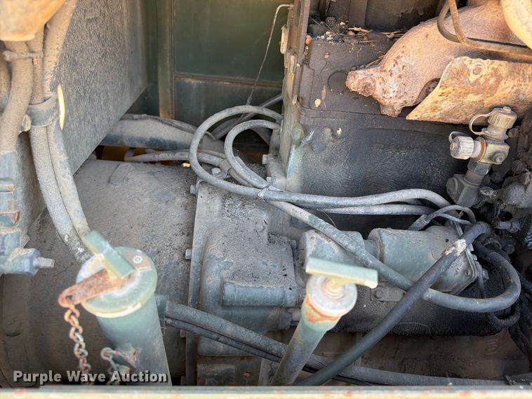 image for item ER3454 1983 Caterpillar 130G MIL motor grader