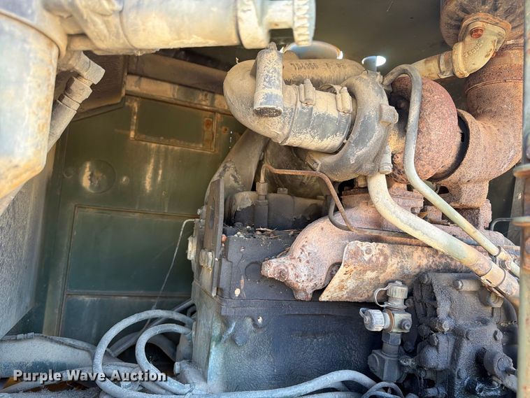 image for item ER3454 1983 Caterpillar 130G MIL motor grader