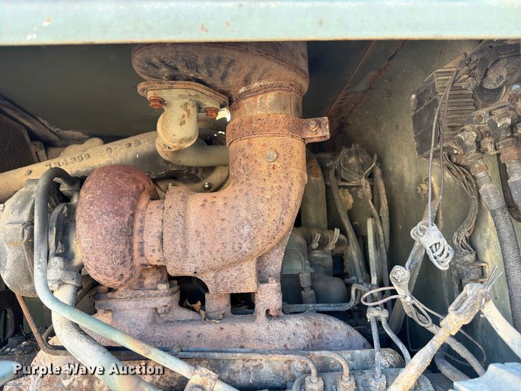 image for item ER3454 1983 Caterpillar 130G MIL motor grader