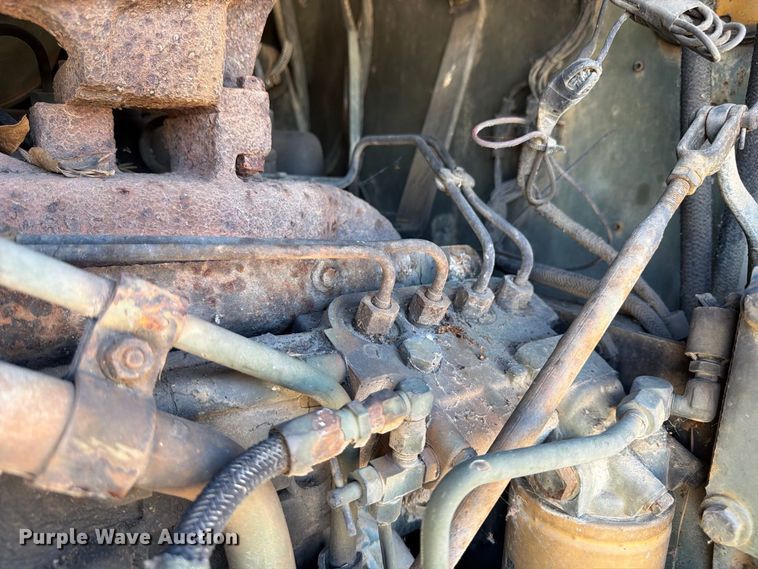 image for item ER3454 1983 Caterpillar 130G MIL motor grader