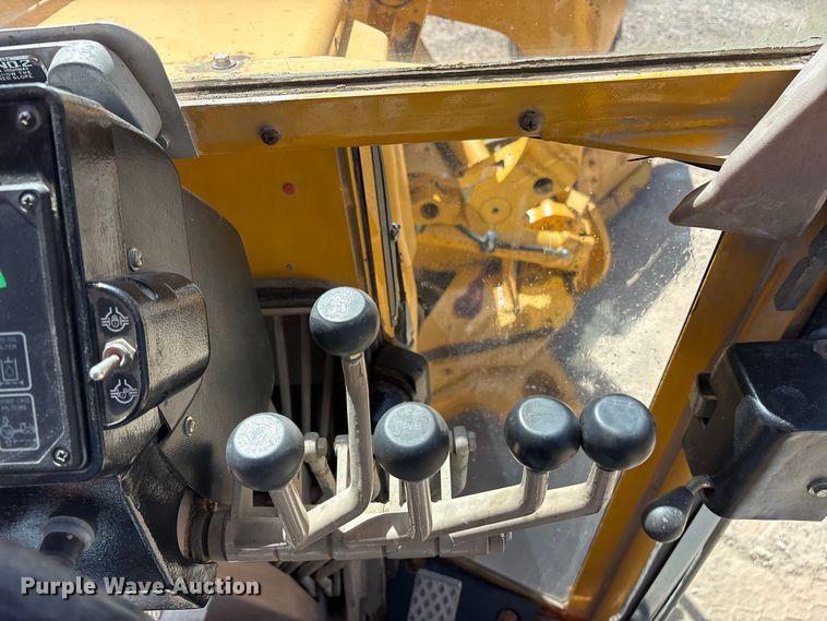 image for item ES8141 1999 John Deere 770CH motor grader