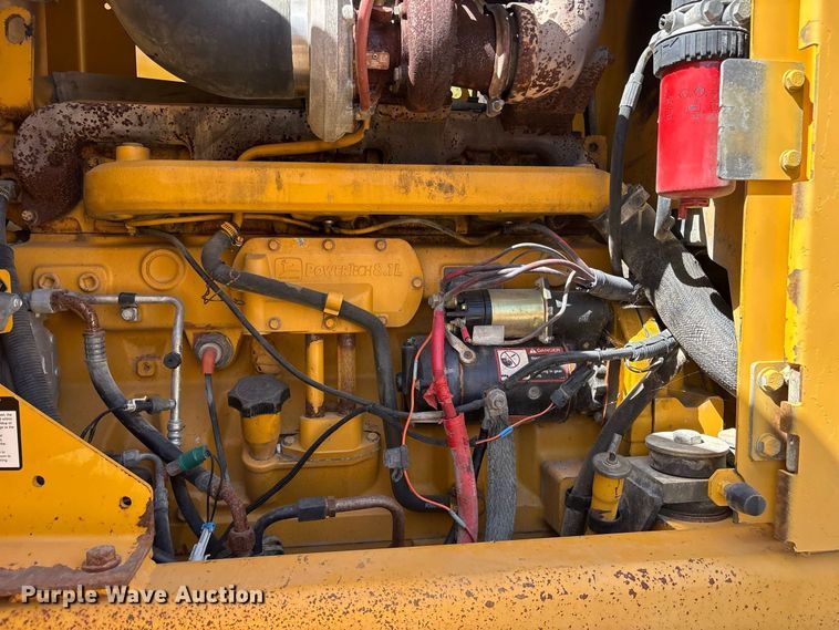image for item ES8141 1999 John Deere 770CH motor grader