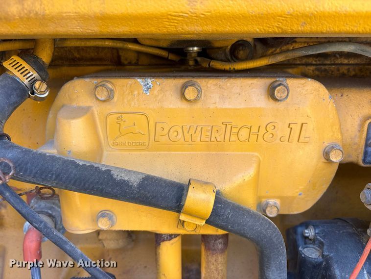 image for item ES8141 1999 John Deere 770CH motor grader