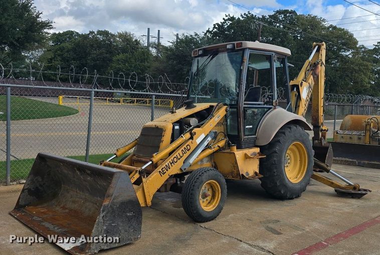 image for item ES8216 1999 New Holland 655E backhoe