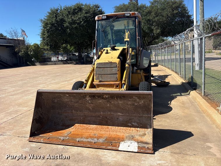 image for item ES8216 1999 New Holland 655E backhoe