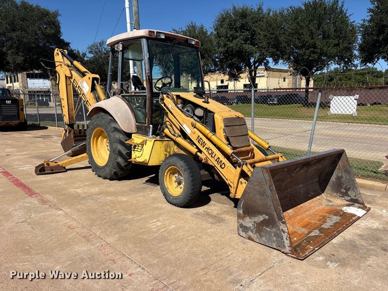 image for item ES8216 1999 New Holland 655E backhoe