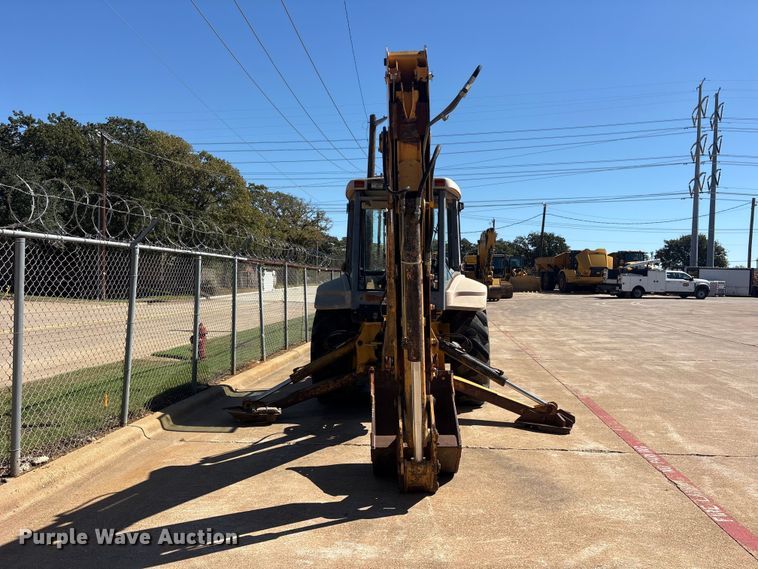 image for item ES8216 1999 New Holland 655E backhoe