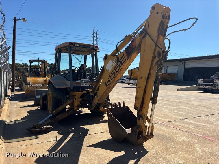 image for item ES8216 1999 New Holland 655E backhoe