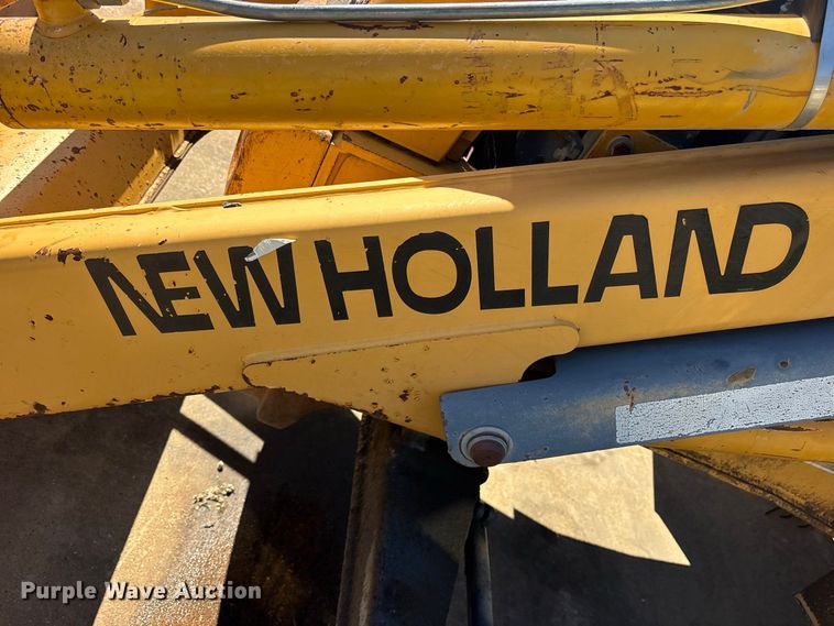 image for item ES8216 1999 New Holland 655E backhoe