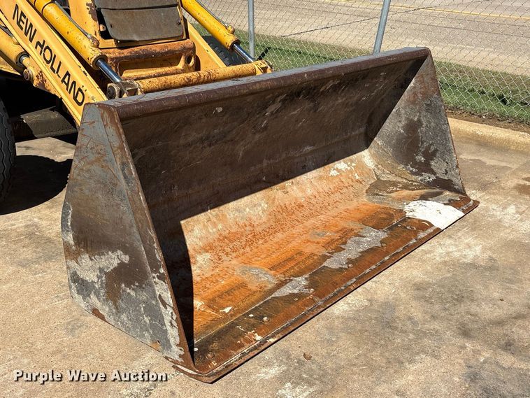 image for item ES8216 1999 New Holland 655E backhoe
