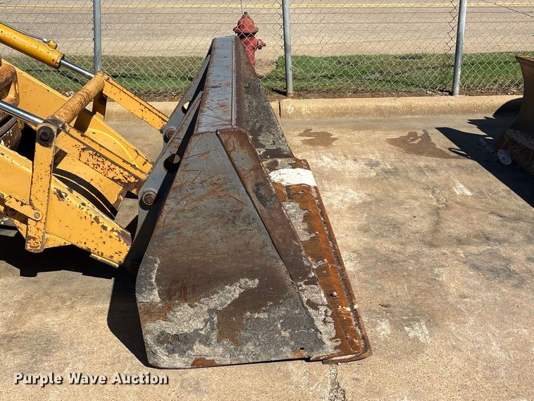 image for item ES8216 1999 New Holland 655E backhoe