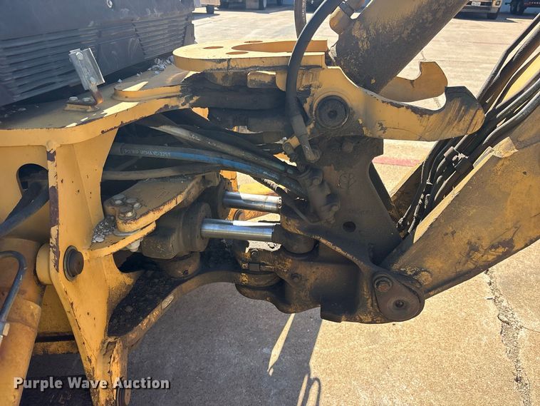 image for item ES8216 1999 New Holland 655E backhoe