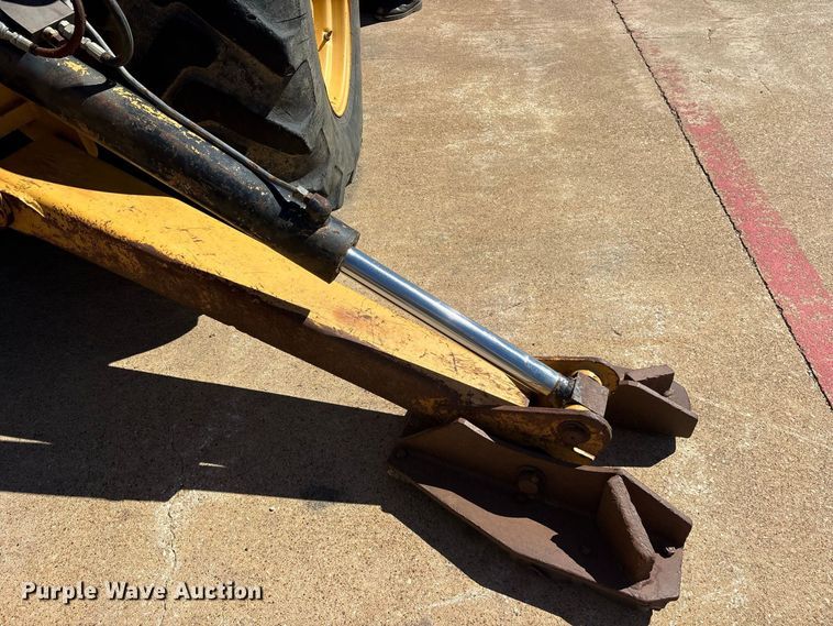 image for item ES8216 1999 New Holland 655E backhoe