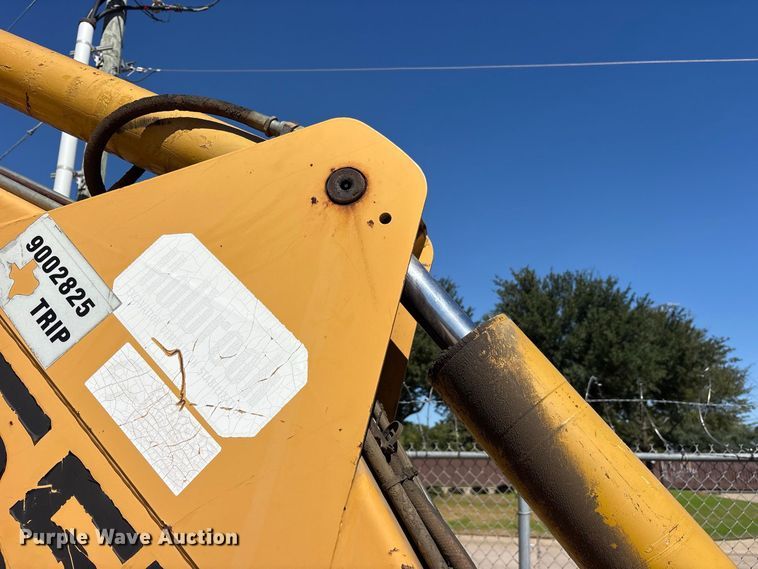 image for item ES8216 1999 New Holland 655E backhoe