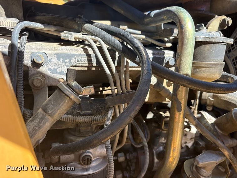 image for item ES8216 1999 New Holland 655E backhoe