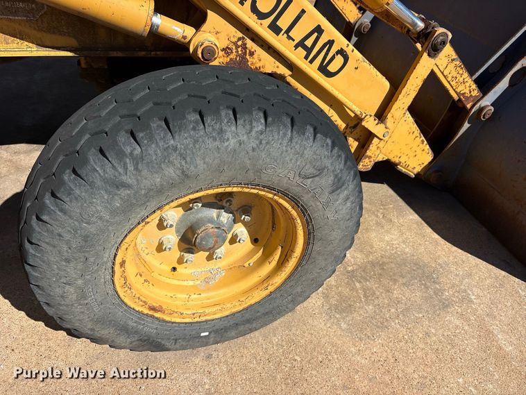 image for item ES8216 1999 New Holland 655E backhoe