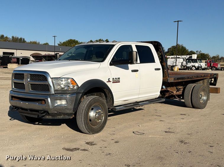 image for item EX1028 2016 RAM 5500 Crew Cab flatbed truck