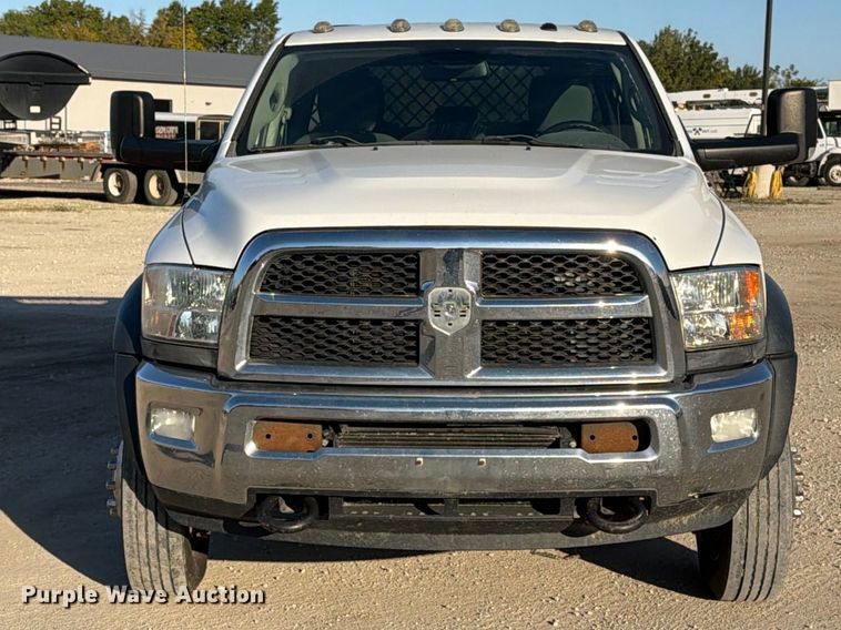 image for item EX1028 2016 RAM 5500 Crew Cab flatbed truck