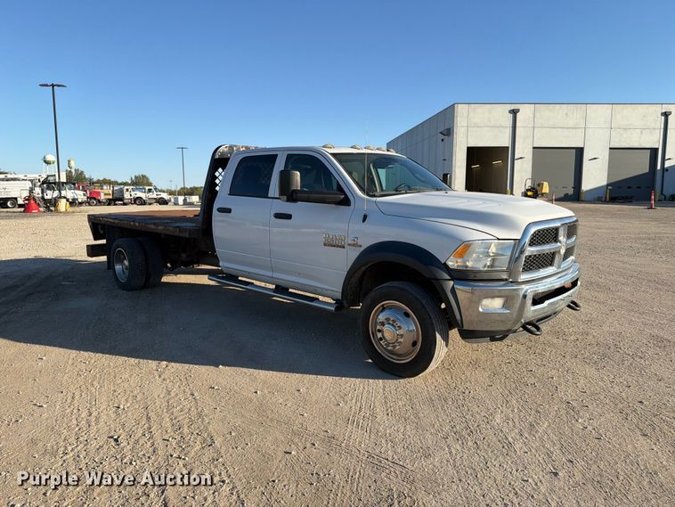 image for item EX1028 2016 RAM 5500 Crew Cab flatbed truck